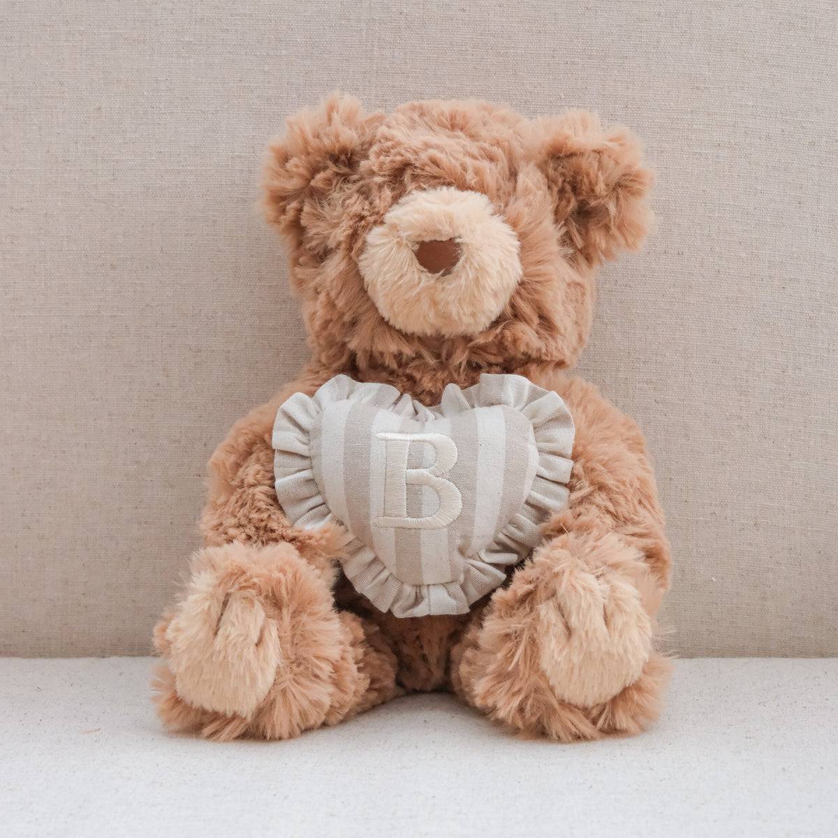 INITIAL TEDDY