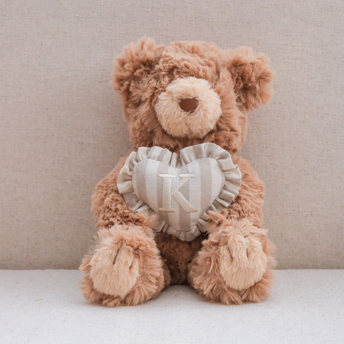 INITIAL TEDDY