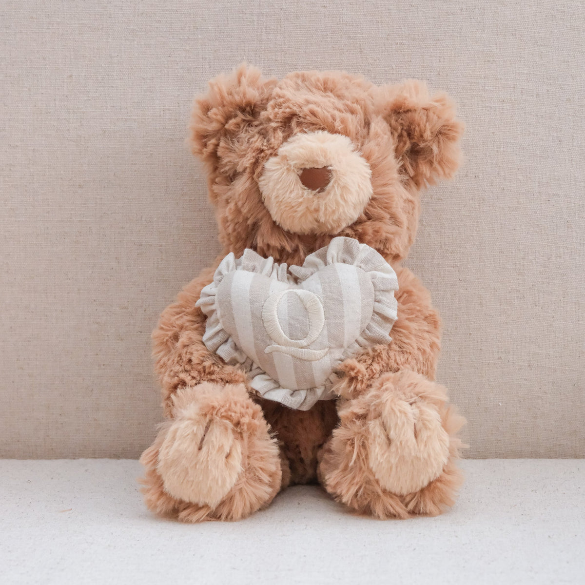 INITIAL TEDDY