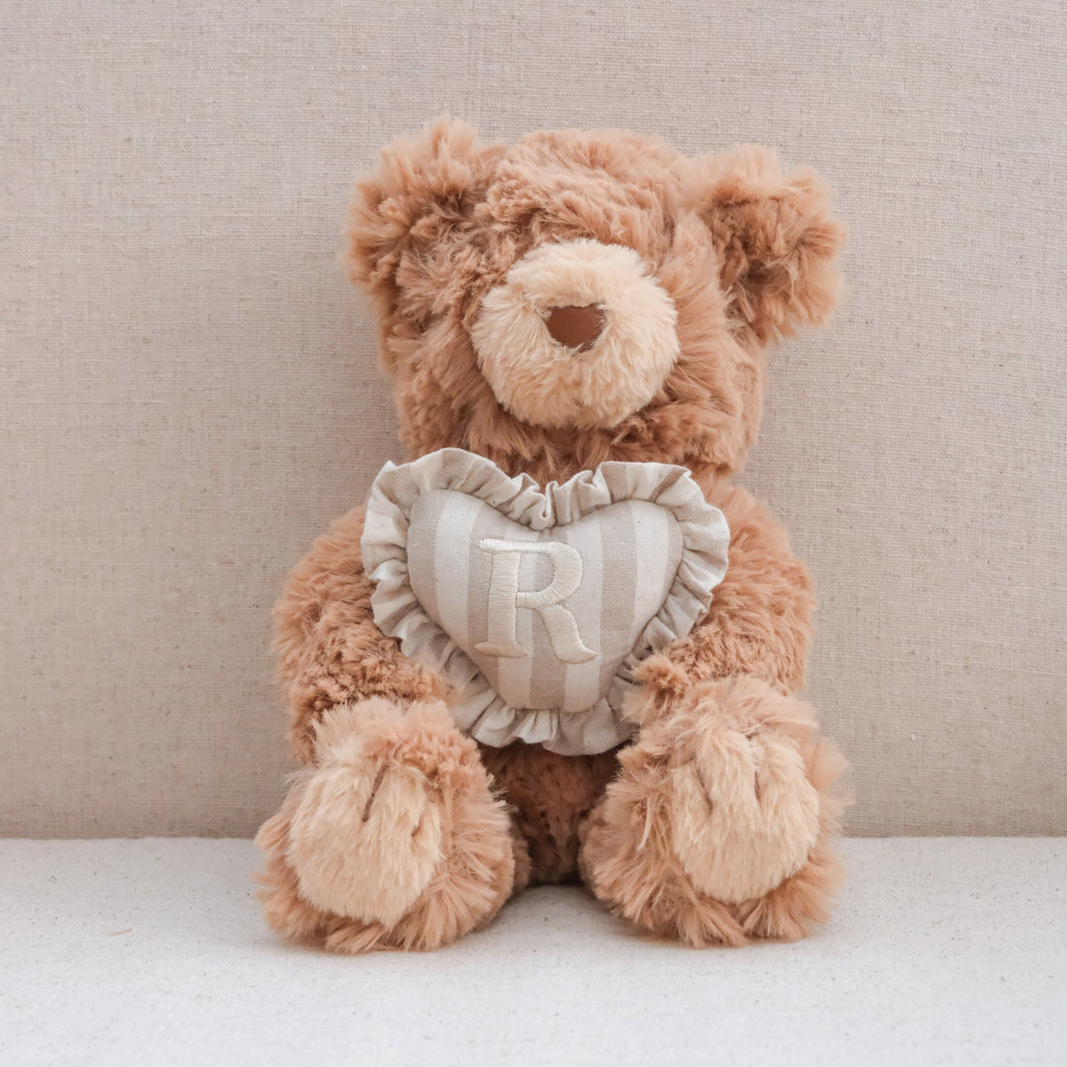 INITIAL TEDDY
