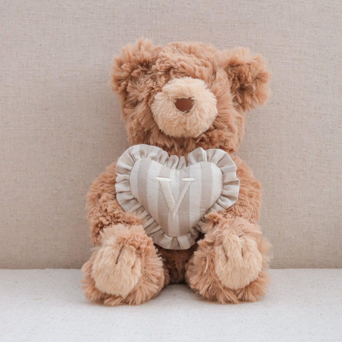 INITIAL TEDDY
