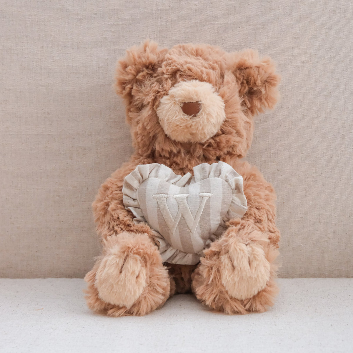 INITIAL TEDDY