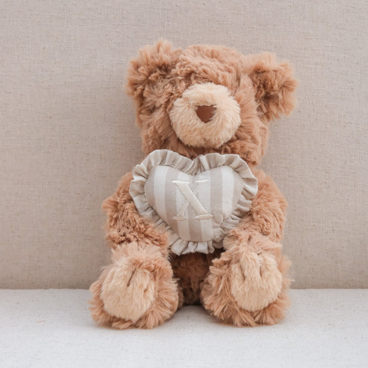 INITIAL TEDDY
