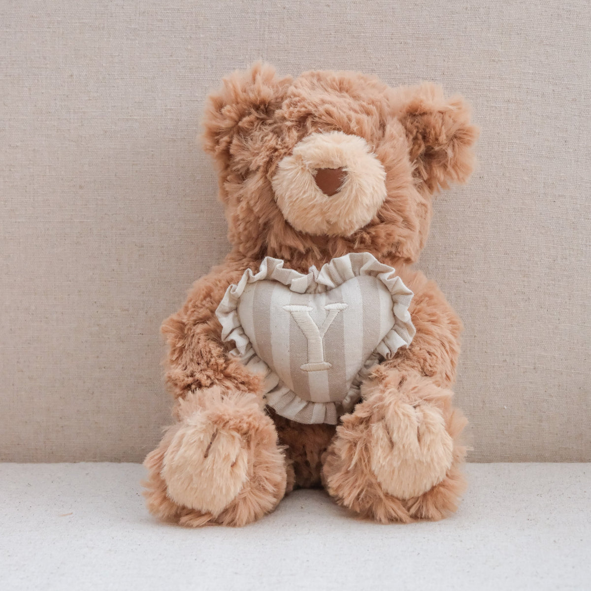 INITIAL TEDDY