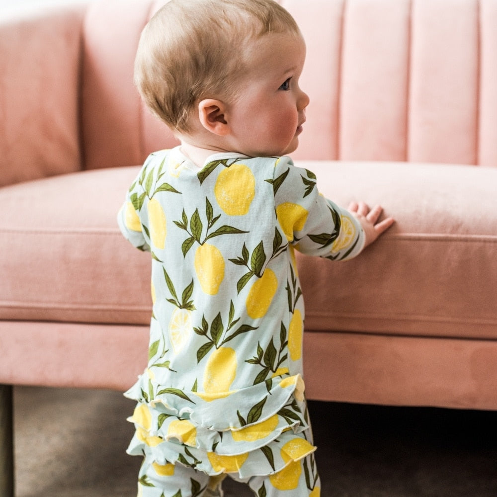 Salt Luxe Solid Ruffle Footed Romper