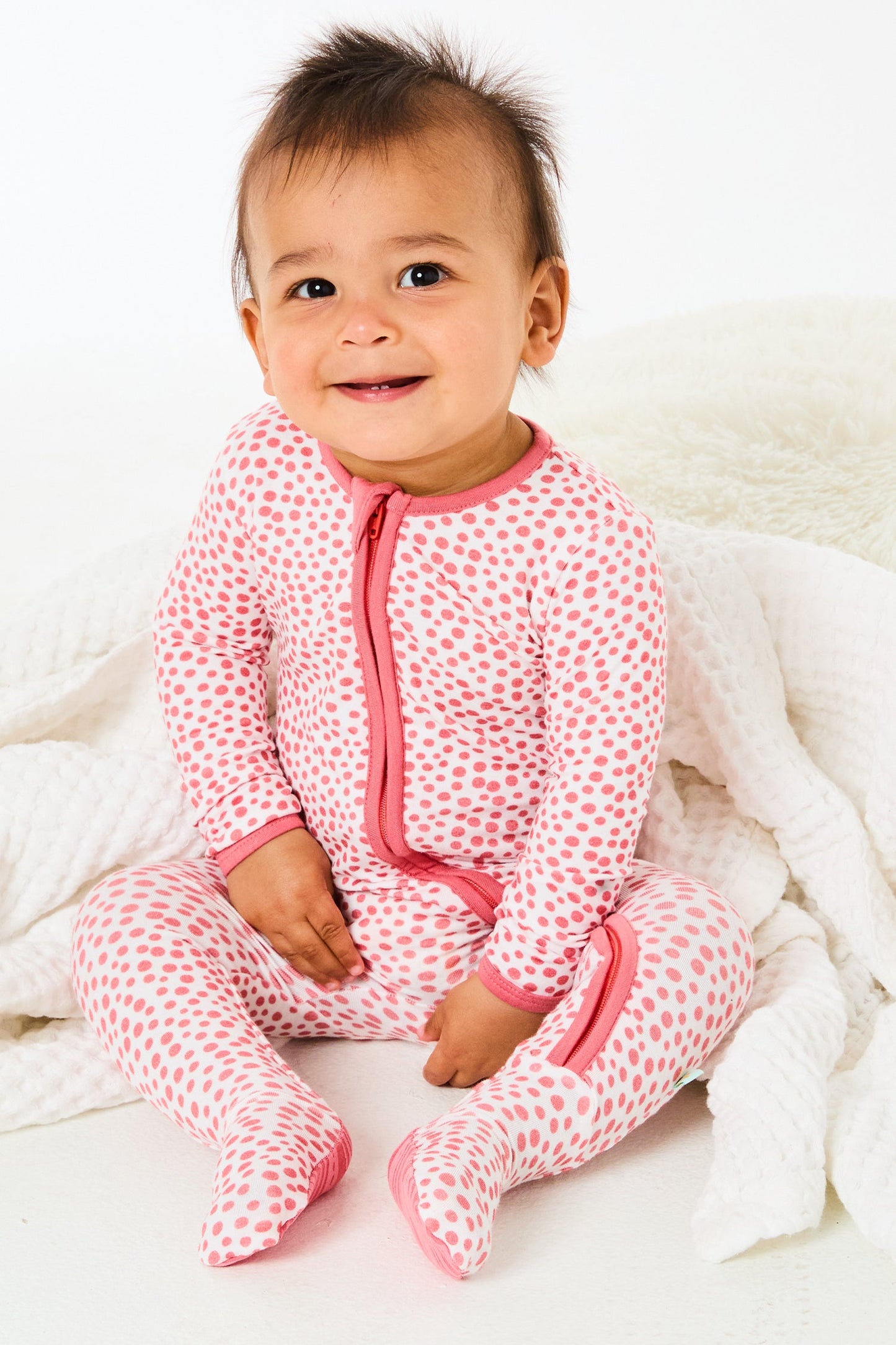 Soft & Stretchy Zipper Footie - Coral Dots